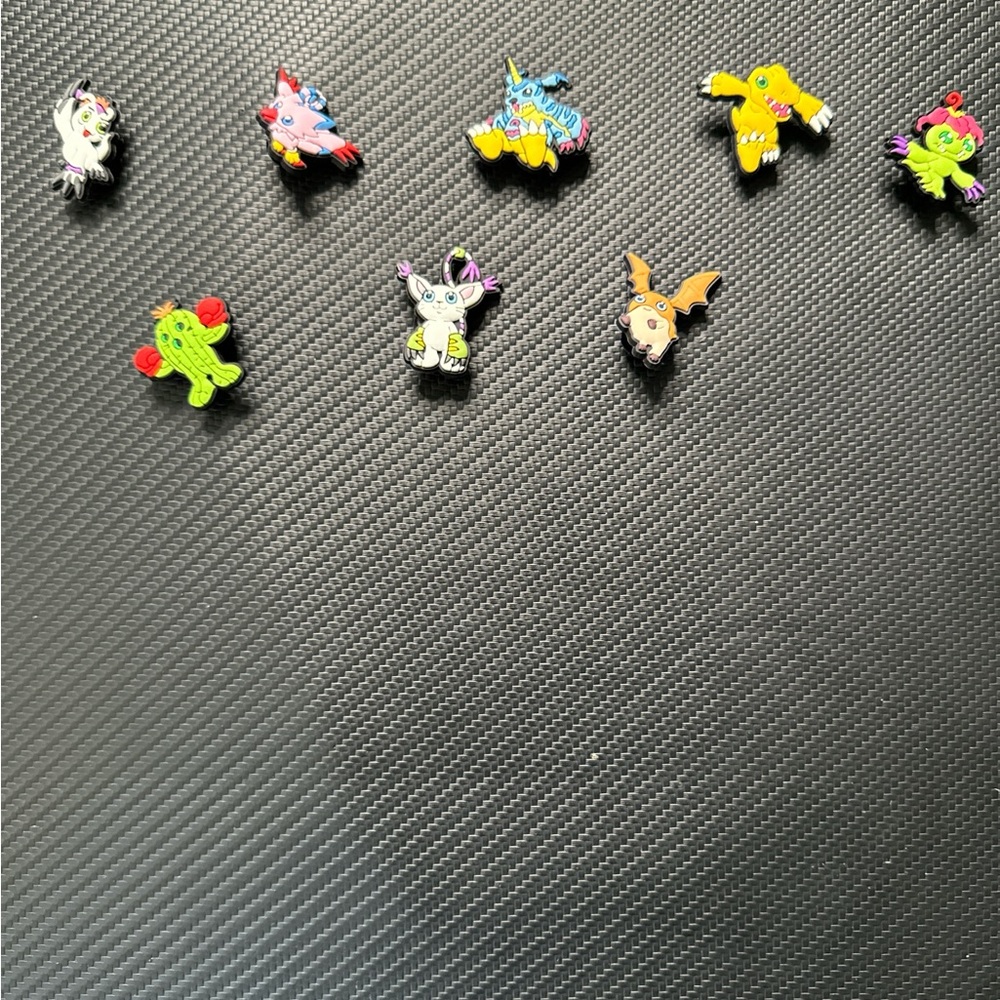 Digimon croc charms